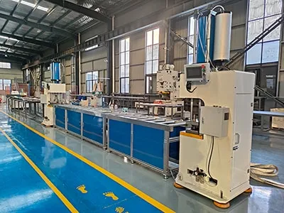 Máquina CNC Doblabora de Barras Colectoras